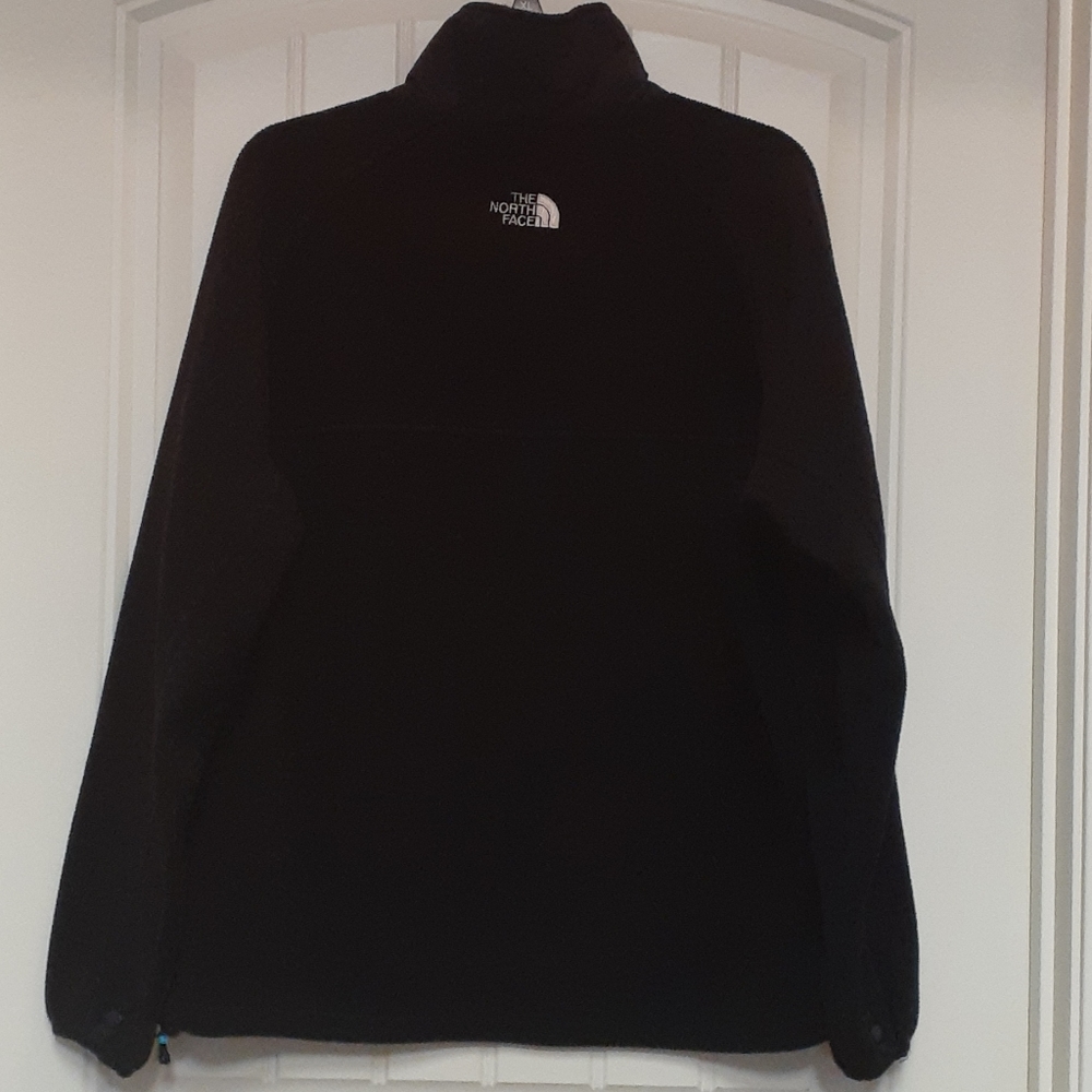 The North Face full zip fleece jacket size medium.